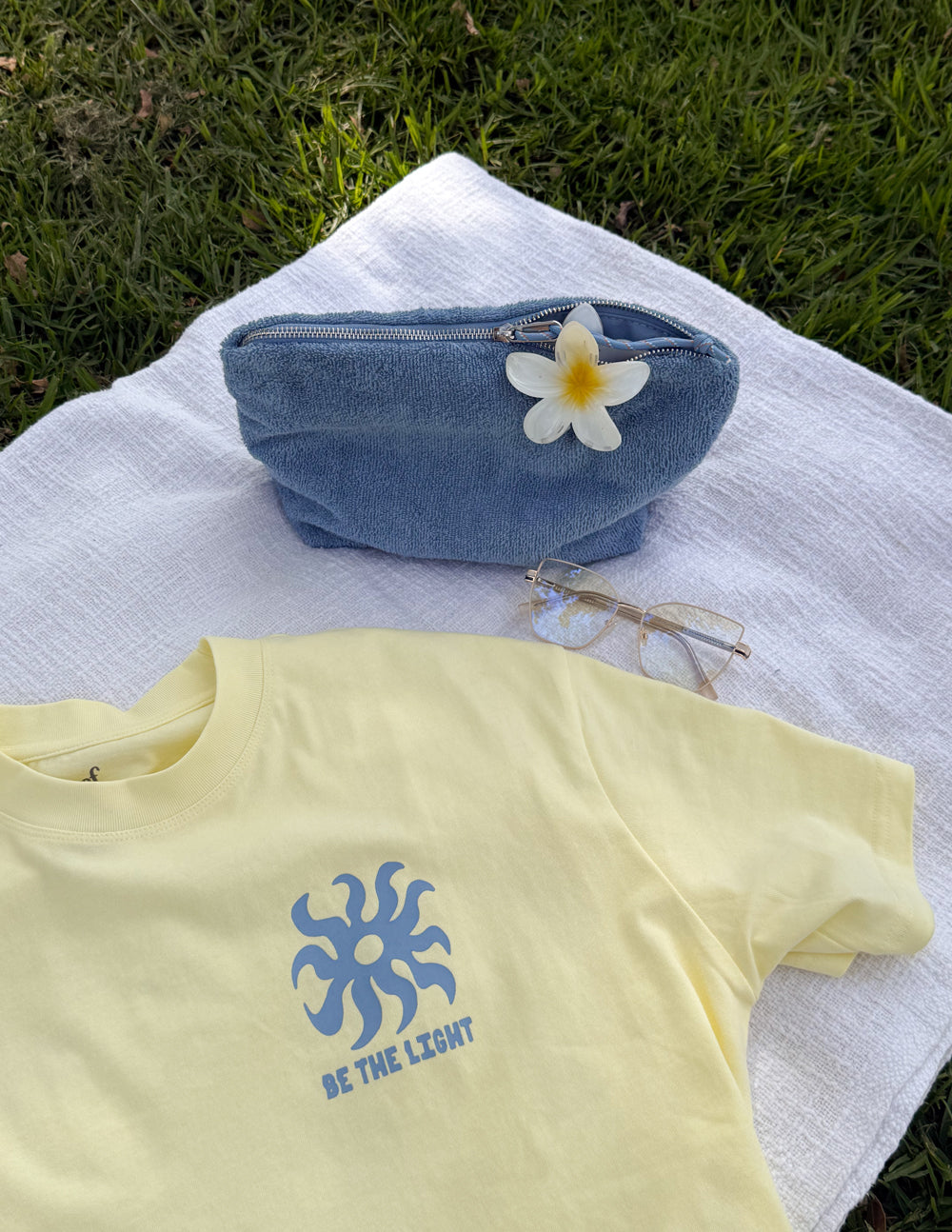 Unisex T-shirt from Elevated Faith with "Be the Light" design, soft fabric, and casual fit, ideal for everyday wear.