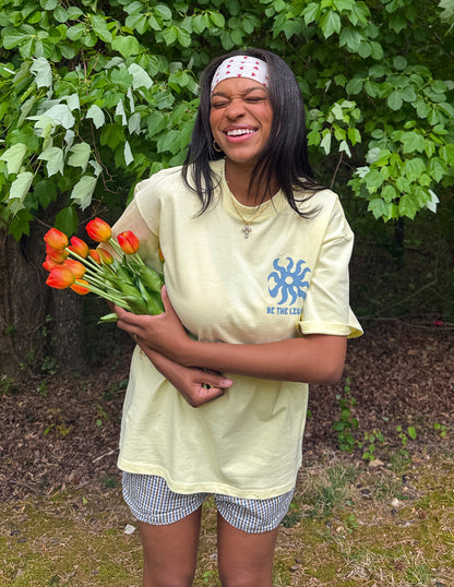 Unisex T-shirt from Elevated Faith with "Be the Light" print, soft fabric, and casual fit, perfect for inspiring everyday wear.