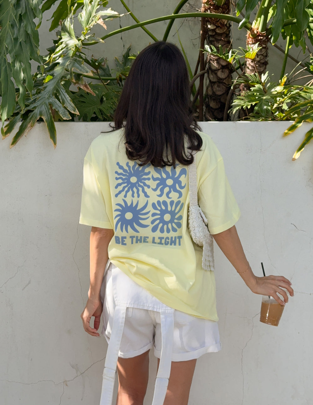Unisex black T-shirt from Elevated Faith with "Be the Light" graphic design, casual fit and comfortable fabric.