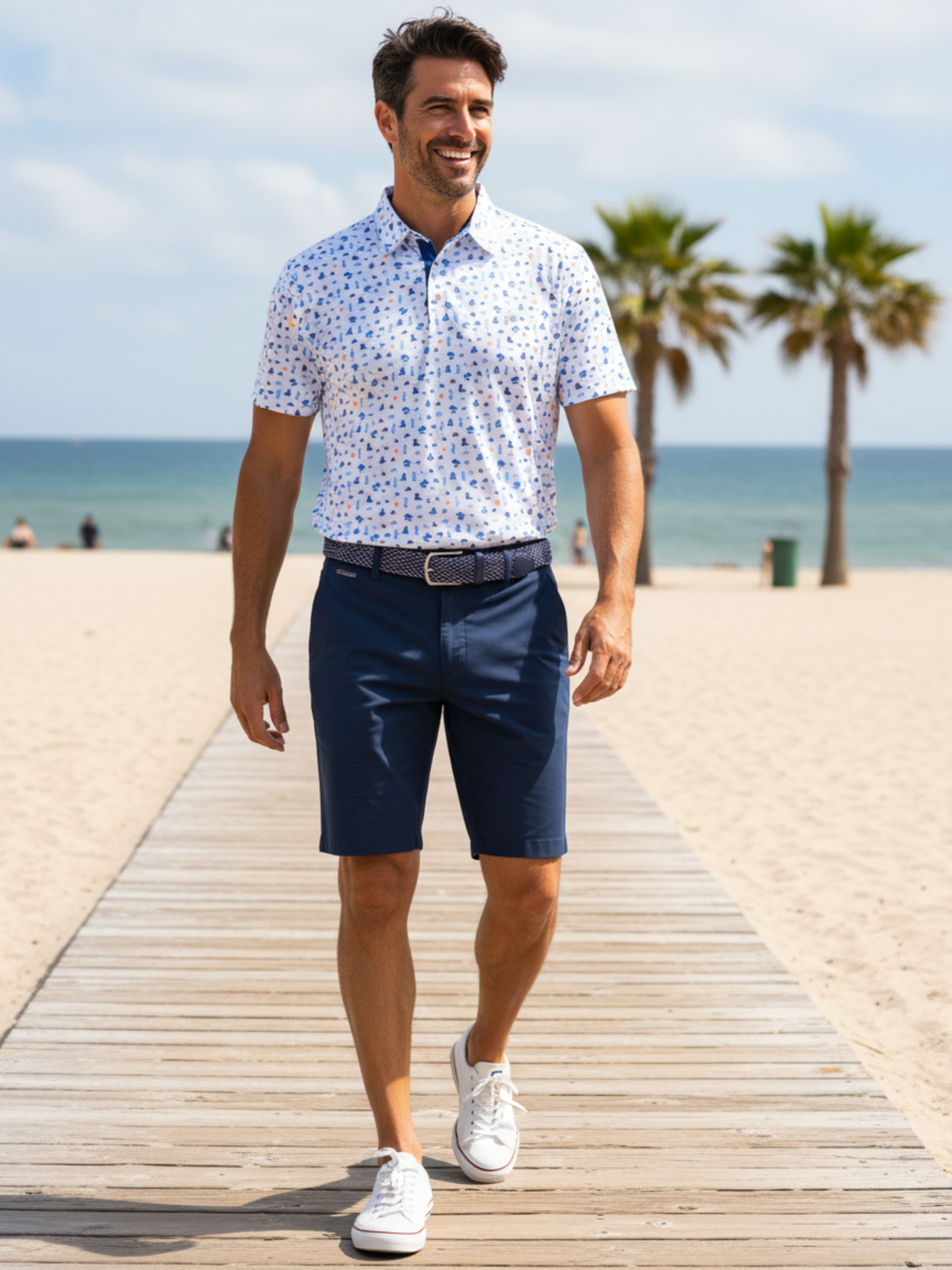 Navy Beachside Performance Polo by White Water Life with a classic collar and logo on the chest, perfect for casual beachwear.