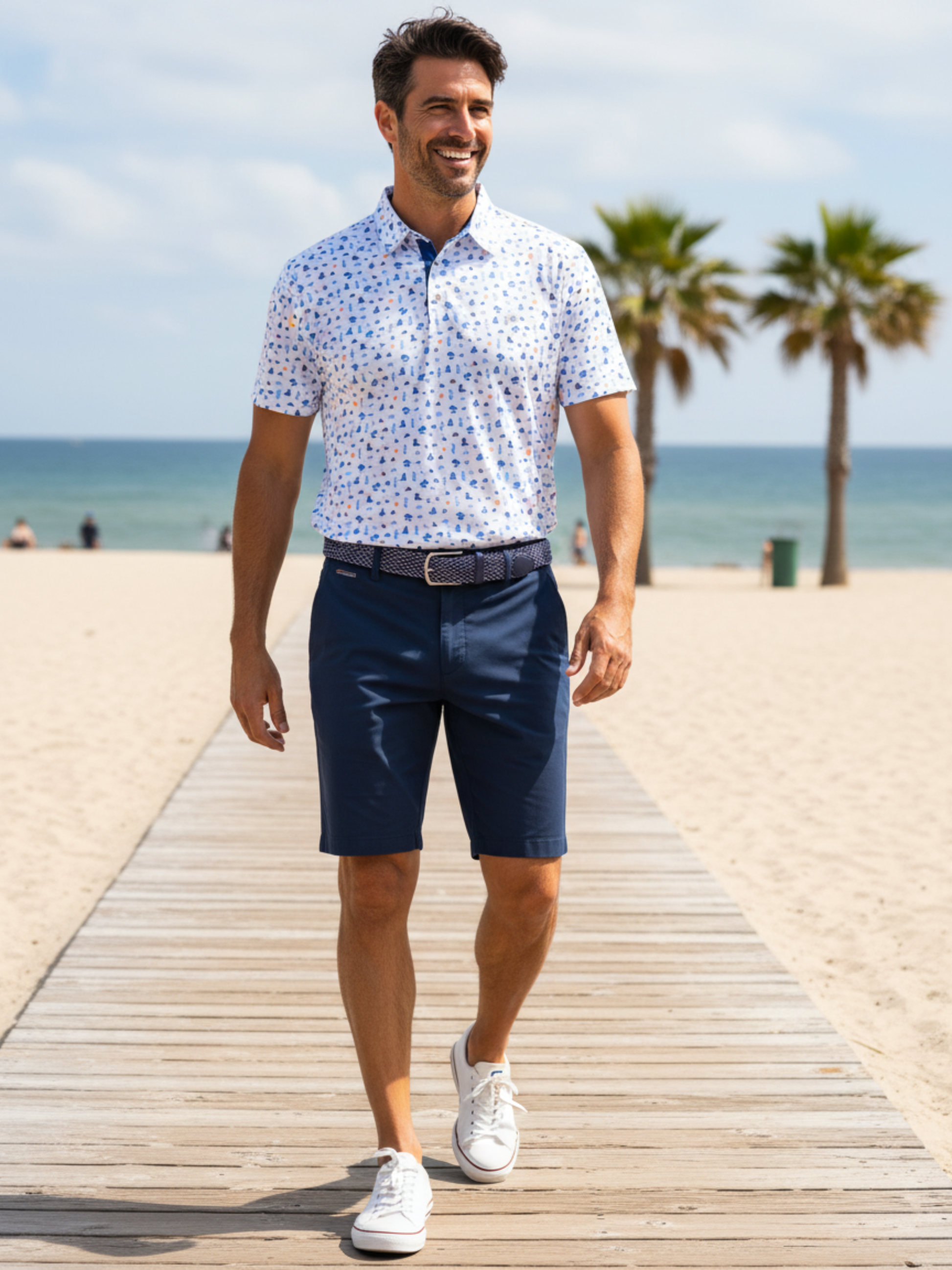 Navy Beachside Performance Polo by White Water Life with a classic collar and logo on the chest, perfect for casual beachwear.