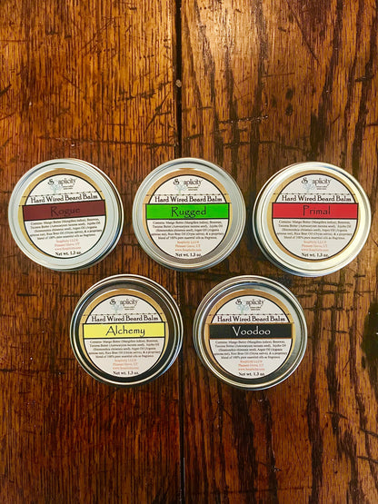 Soaplicity Rogue Hard Wired Beard Balm jar with label, showing the beard balm product for grooming and styling beards.
