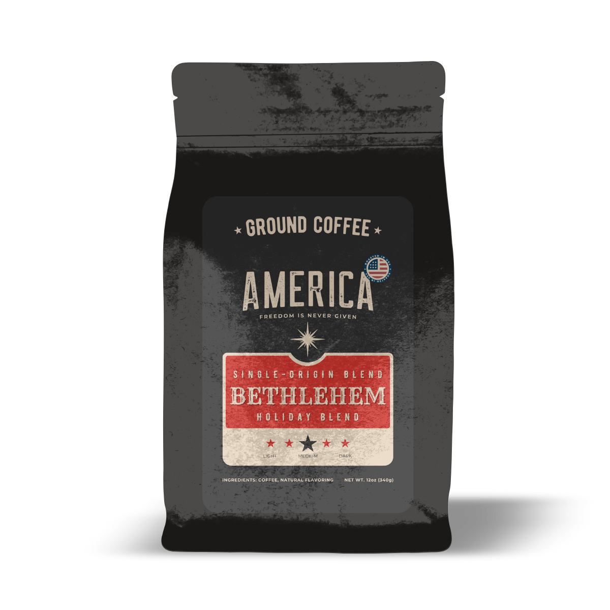 Ground Bethlehem Holiday Blend coffee by America Supply Company LLC in a clear bag with a dark roasted appearance.