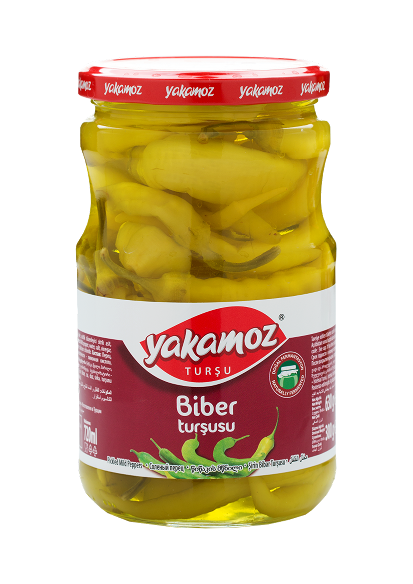 Glass jar of S101 Yakamoz Mild Pepper Pickle with whole peppers, showcasing the colorful, spicy peppers inside.