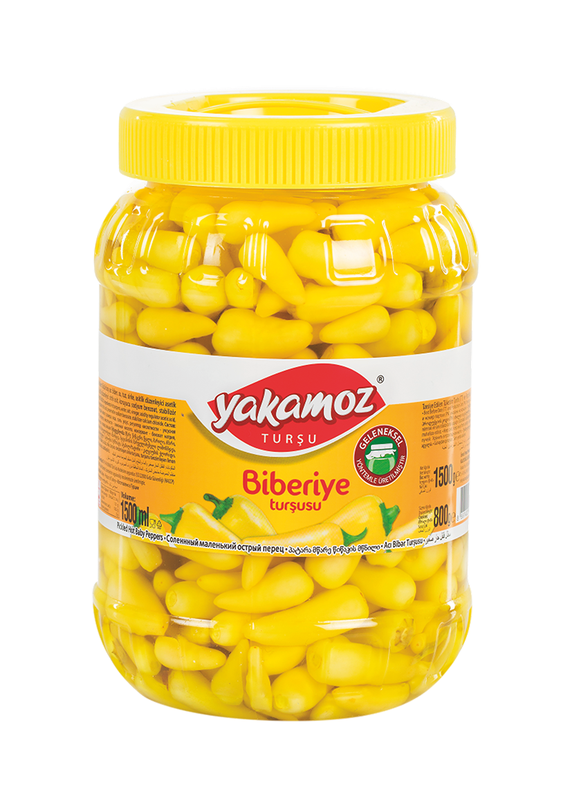Glass jar of Yakamoz Hot Baby Pepper Pickles by S101, featuring vibrant, spicy baby peppers in a clear jar.