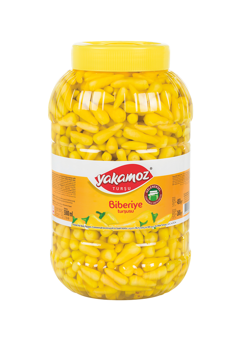 Glass jar of Yakamoz Hot Baby Pepper Pickles by S101, featuring vibrant red baby peppers and fresh herbs inside.