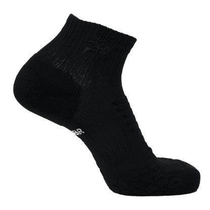 Black AMP ankle compression sock by iReliev, designed for support and improved circulation in the ankle area.