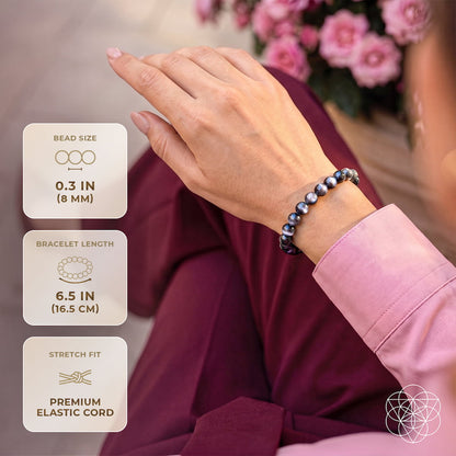 Black moonstone bracelet from The Empath’s Cord Cutter collection by Conscious Items, featuring smooth black stones on a sleek bracelet.