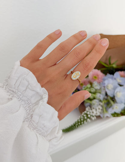 Elevated Faith Bloom Again enamel ring featuring a floral design, crafted with colorful enamel and silver-tone band.