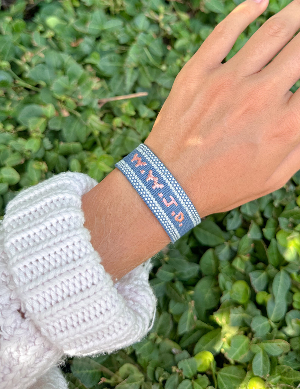 Blue WWJD embroidered bracelet wristband by Elevated Faith featuring faith-inspired design and detailed stitching.