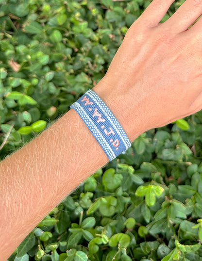Blue WWJD embroidered wristband bracelet by Elevated Faith featuring inspirational faith-themed design.