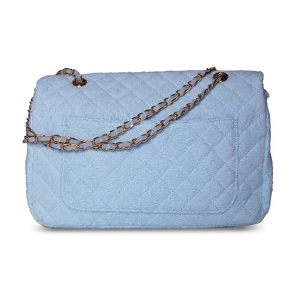 Beach Haus Medium Shoreline Flap in powder blue, showing the flap design and soft fabric texture.