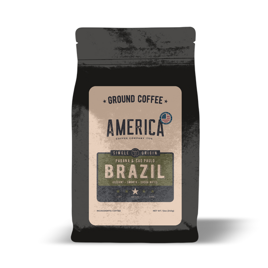 Ground Brazil single origin natural coffee from America Supply Company LLC, showing a close-up of the coffee grounds.
