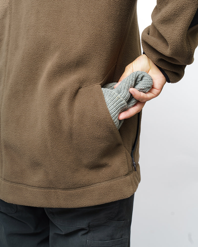 Off The Grid Surplus Bruin Fleece Zip Up in Major Brown, close-up of fleece fabric and front zipper detail.