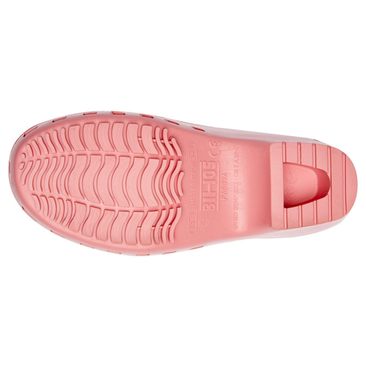Calzuro Classic Bubblegum clogs showing textured bottom sole with slip-resistant pattern and vibrant pink color.