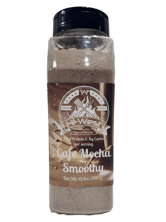 Hi-West Cafe Mocha Protein Shake in a glass with whipped cream and chocolate drizzle, ready to enjoy.