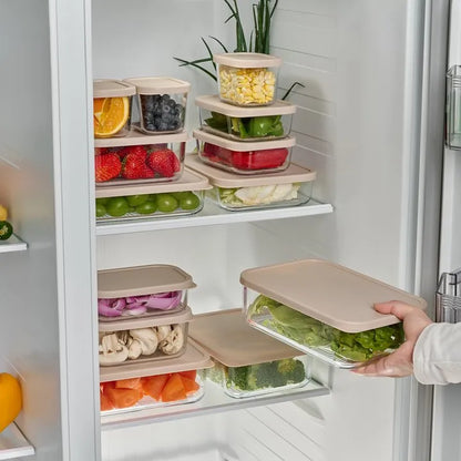 Dura Living glass food storage set with 12 airtight containers in mixed sizes, featuring lids, filled with cashew cream.