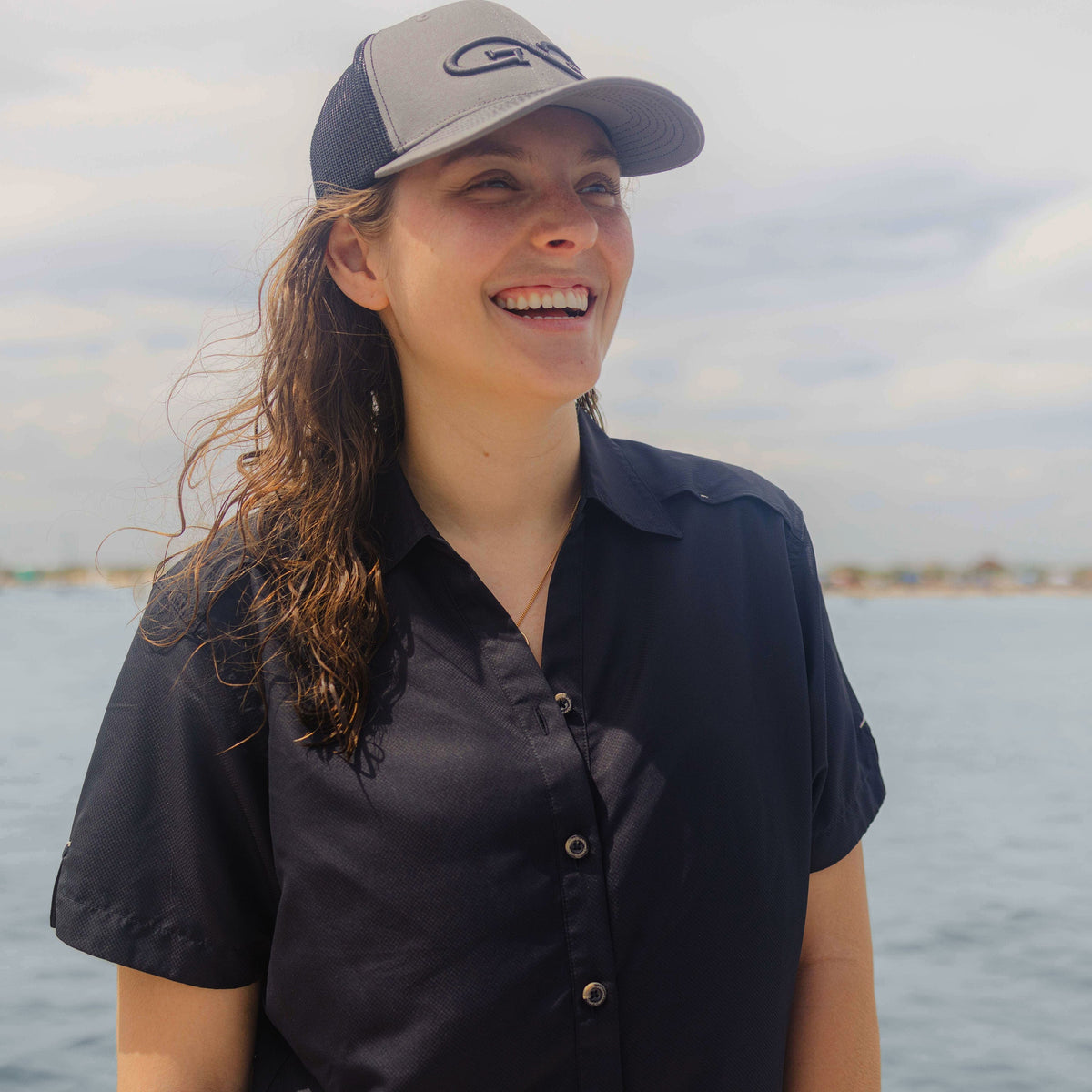 Caviar Ladies' Original MicroFiber Shirt from GameGuard, showing a close-up of the soft, textured microfiber fabric and stylish fit.