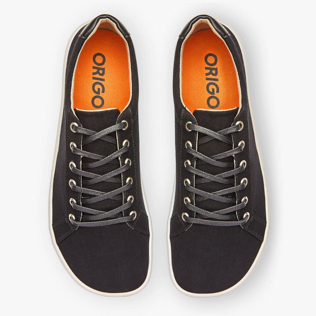 Black men's Origo Shoes Everyday Sneaker Gen 3 made of cotton canvas, featuring a sleek barefoot shoe design.