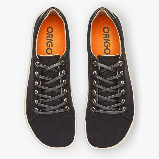 Black men's Origo Shoes Everyday Sneaker Gen 3 made of cotton canvas, featuring a sleek barefoot shoe design.