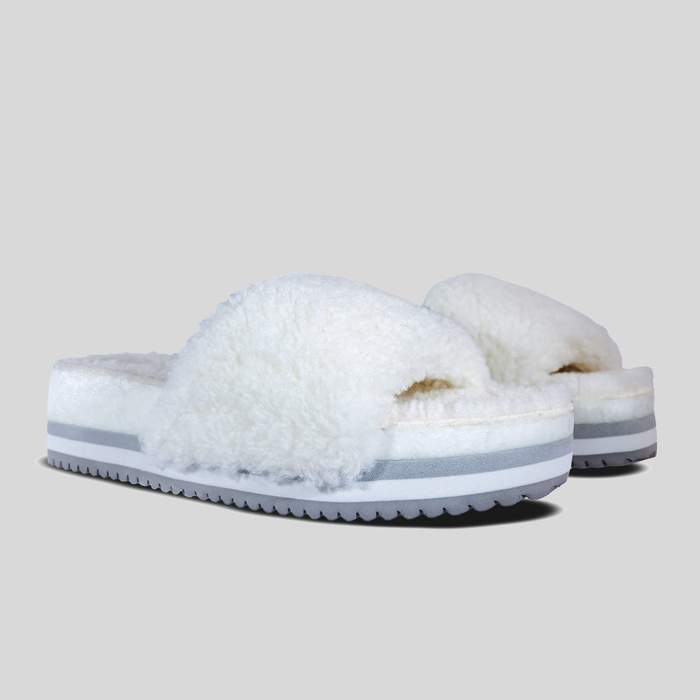 Pair of Fleks Cito Iceberg San Ysidro slides in a side and angle view, showcasing the sleek design and icy blue color.