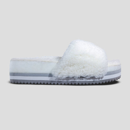 Fleks San Ysidro Cito Slide Iceberg sandal with single strap and profile view, showcasing its minimalist design and neutral color.