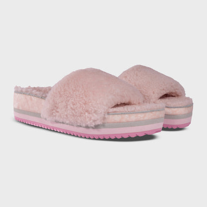 Pair of Fleks San Ysidro Slides in Peony color, showing the comfortable slip-on design and textured straps from an angled view.