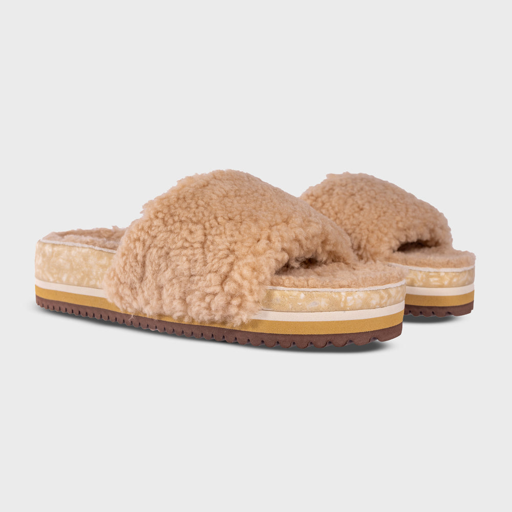 Fleks Cito Slide San Ysidro sandal in sandy color, side view showing open toe and comfortable slide design.