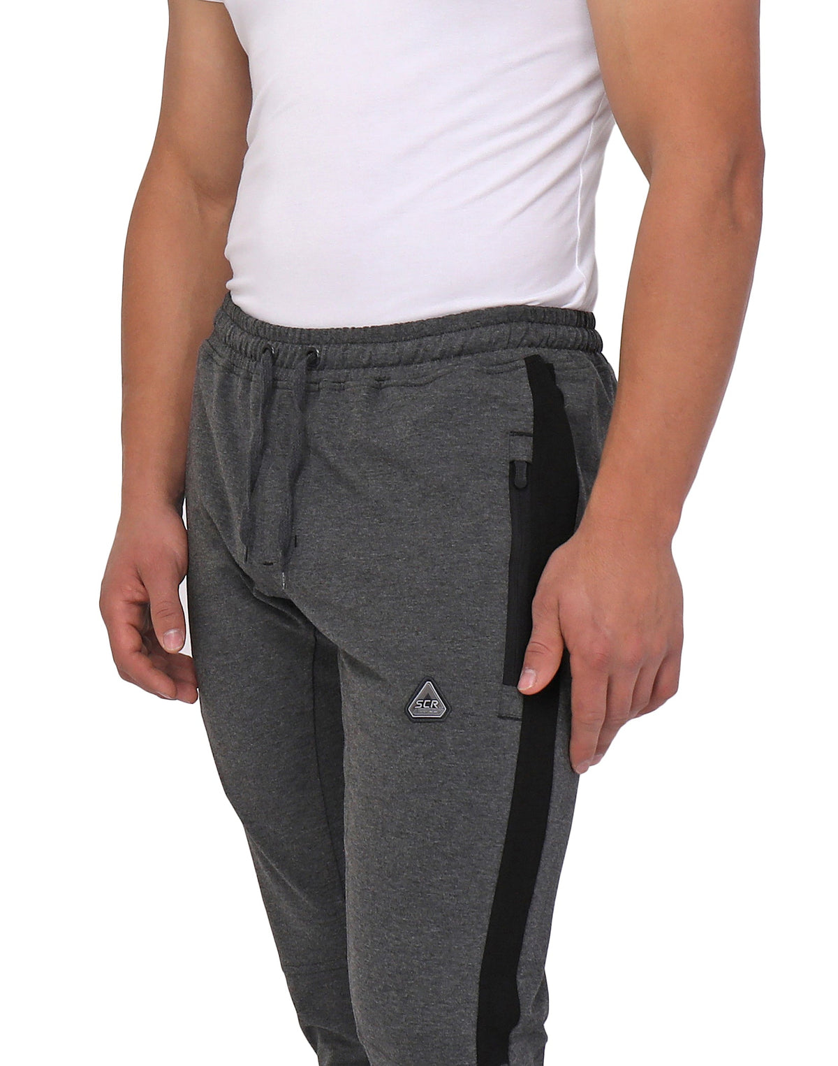 Close-up of SCR Sportswear Infinite Flex Tall Fit men's joggers sweatpants showing elastic waistband and soft fabric detail.