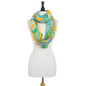 Multicolor floral print infinity scarf from BACKUPMYFILESNOW®, featuring vibrant floral patterns and soft fabric for stylish wear.