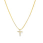 Dainty gold CZ pave cross pendant on a box chain necklace by Mia Jewelry, showcasing a sparkling religious jewelry piece.
