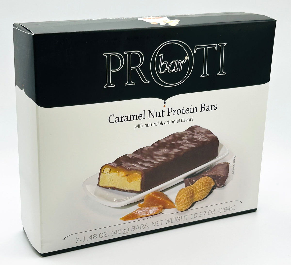 AmBari Nutrition Caramel Nut Protein Bar showing a close-up of the bar with caramel and nut pieces on the packaging.