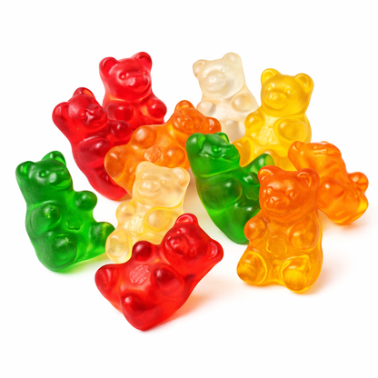 Colorful Haribo Goldbears gummy candy in bright red, green, yellow, and orange, arranged in a pile on a white background.