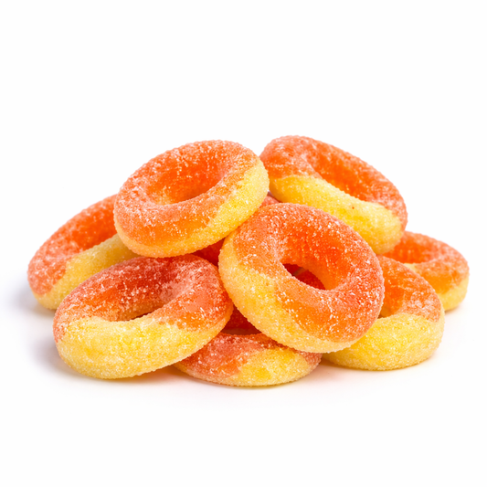 Colorful Albanese Peach Rings gummy candies from Candy In Bulk, shaped like peaches with a soft, chewy texture.