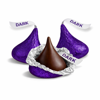 Hershey's Kisses Special Dark chocolate candies in bulk, featuring dark, mildly sweet chocolate with foil wrapping and a classic shape.