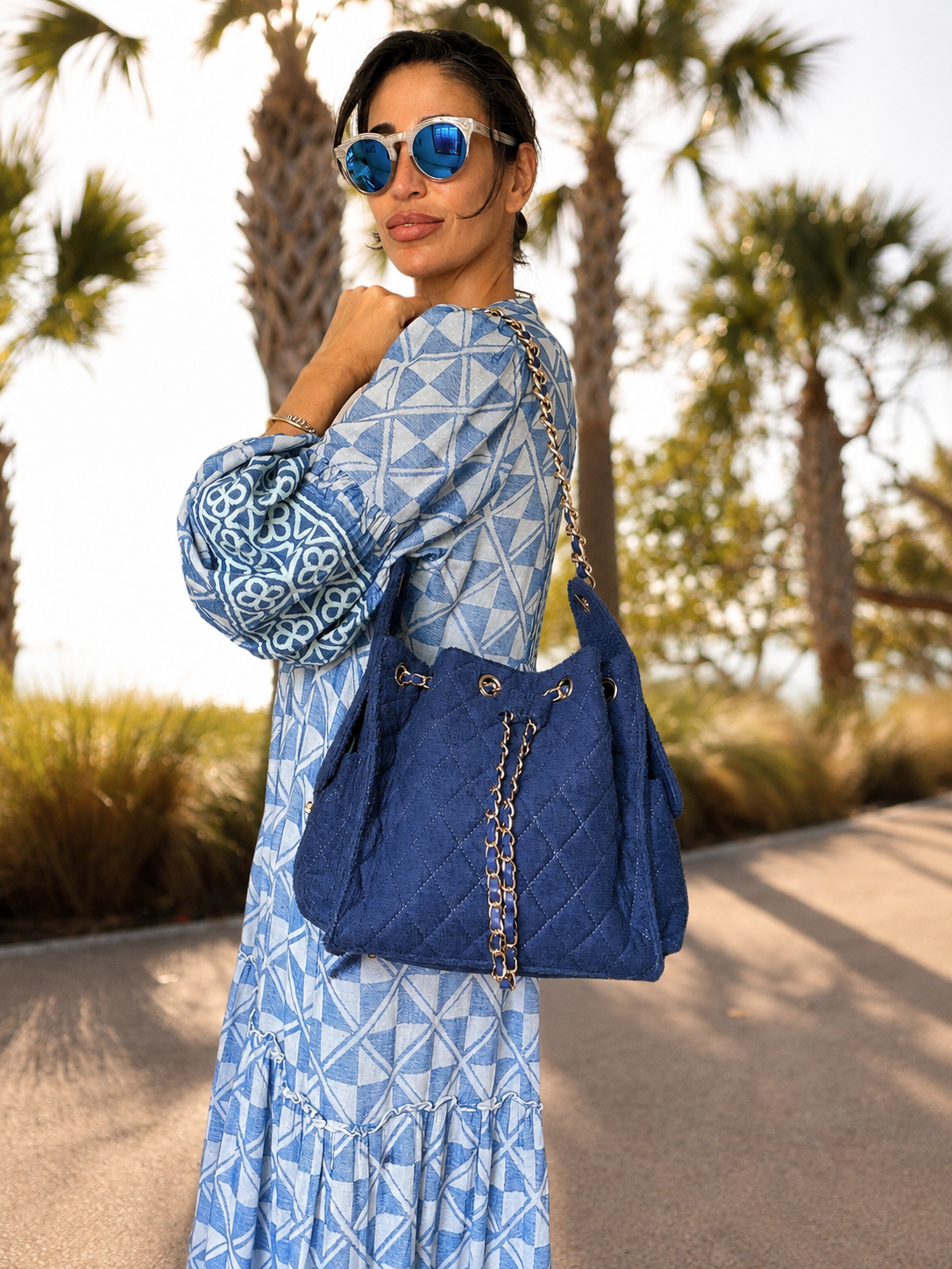Small navy Bayshore Bucket from BEACH HAUS featuring a woven design and sturdy handle, perfect for beach or outdoor use.