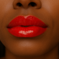 Shiny diamond lip gloss by KE Cosmetics, featuring a clear tube with sparkling gloss inside, perfect for glossy lips.