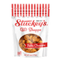 Stuckey’s Petite Cheecans snack gift bag with 6 oz of crispy, cheesy corn snacks in colorful packaging.