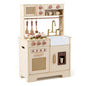 Child playing with GBruno pretend play kitchen featuring realistic lights, sounds, oven, stove, and kitchen accessories.