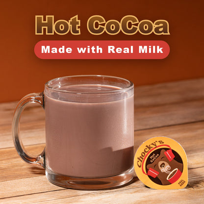 A jar of Java House Chocky's Hot Cocoa powder with a spoon resting on top, ready for making hot chocolate.