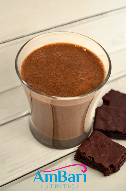 Chocolate Brownie Shake by AmBari Nutrition featuring a creamy chocolate and brownie-flavored protein shake in a glass.