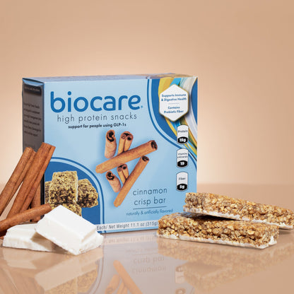 Biocare High Protein Cinnamon Crisp Bar showing the crunchy bar with cinnamon flavor and textured surface.
