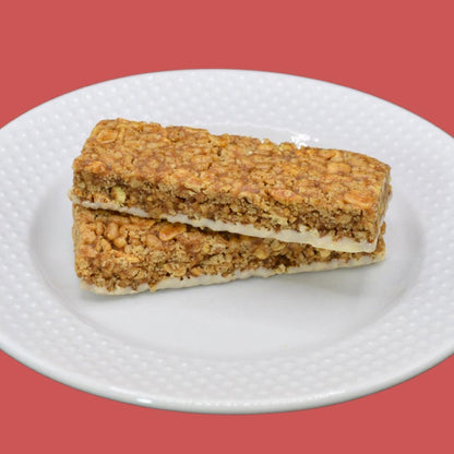 AmBari Nutrition Cinnamon Crisp protein bar showing a crispy cinnamon-flavored bar with textured surface and packaging.