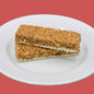 AmBari Nutrition Cinnamon Crisp protein bar showing a crispy cinnamon-flavored bar with textured surface and packaging.
