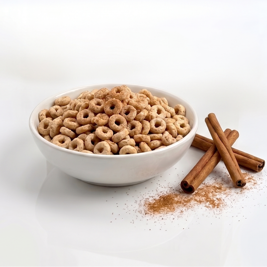 Bowl of AmBari Nutrition Cinnamon-O cereal with cinnamon-flavored cereal pieces and milk in a white bowl.