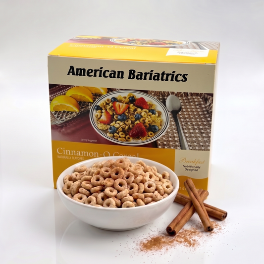 AmBari Nutrition Cinnamon-O cereal box with a bowl of cinnamon-flavored cereal topped with milk, showcasing the breakfast product.