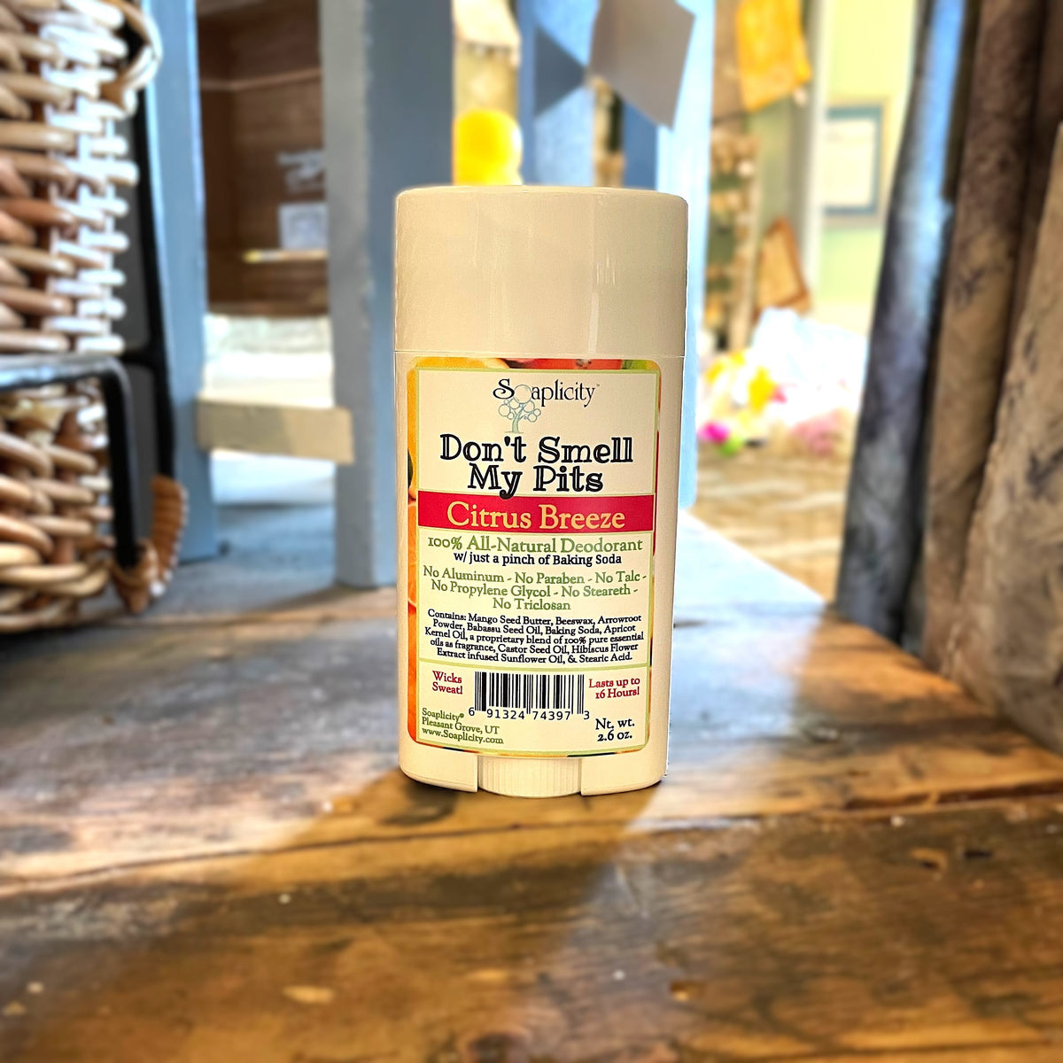 Natural deodorant by Soaplicity with Citrus Breeze scent, featuring a sleek tube and fresh citrus label.