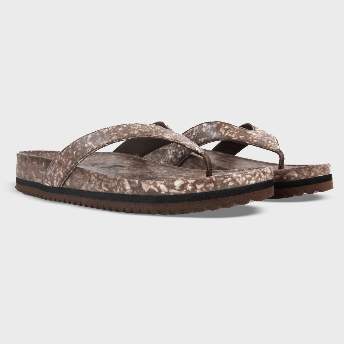 Fleks West Beach Flip Flop in coconut shell design, featuring tan straps and textured sole, angled view of the casual summer footwear.