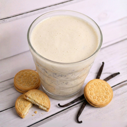 Creamy cookie shake from AmBari Nutrition with cookies and cream flavor in a glass, topped with whipped cream and cookie crumbles.