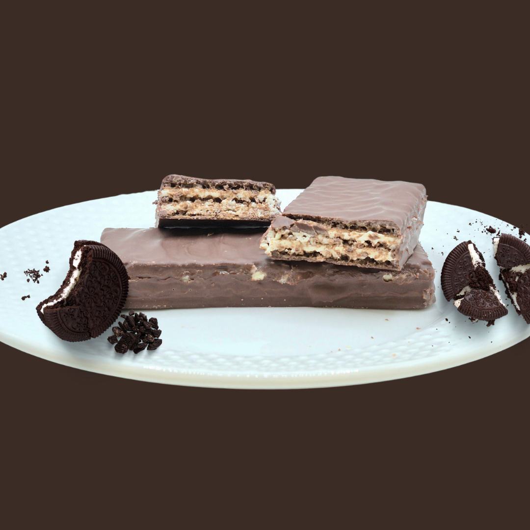 AmBari Nutrition PROTIDIET wafer bar with cookies and cream flavor, showing a crunchy chocolate-coated wafer with creamy filling.